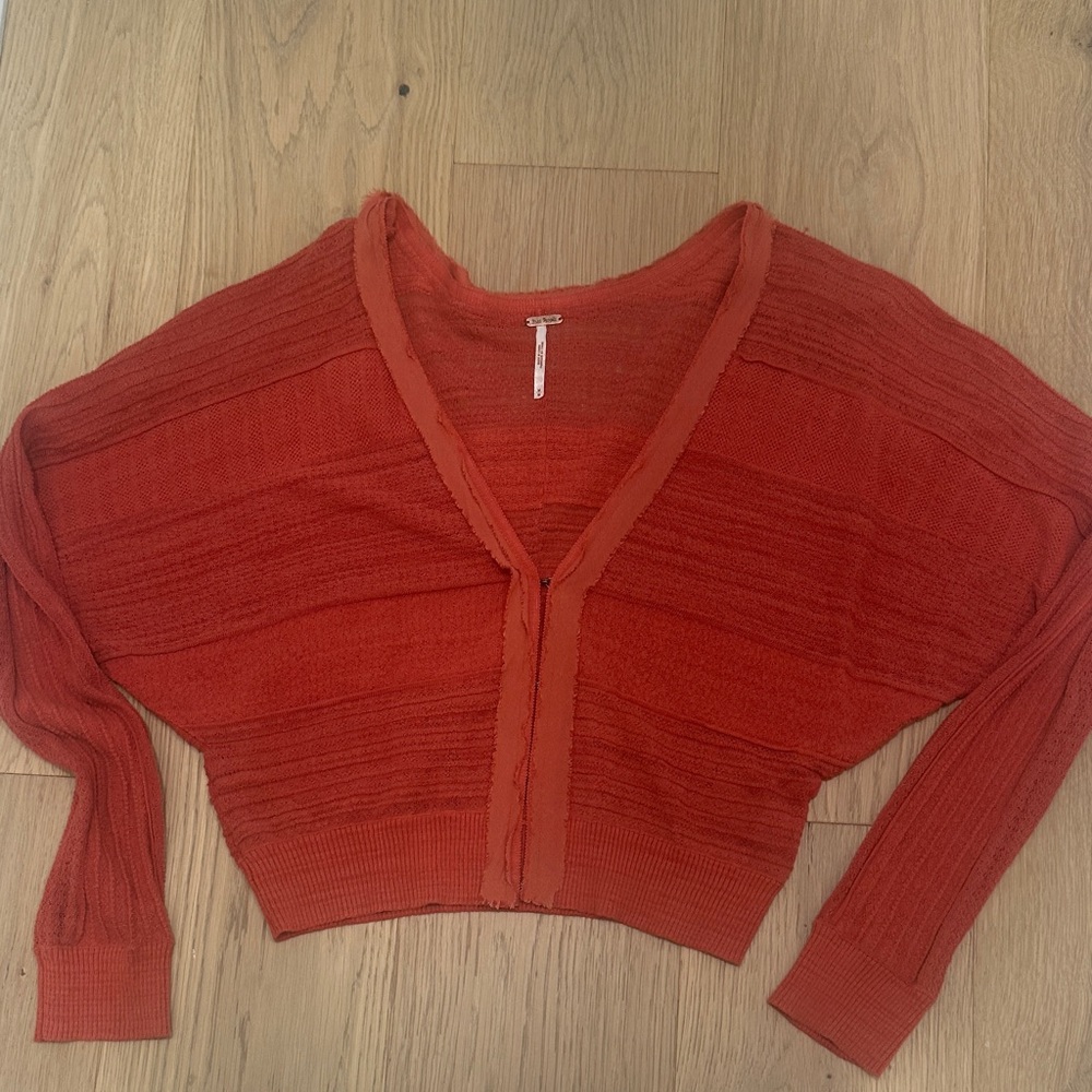 Free People Rust Orange Knit Cropped Sweater. Pretty ribbon detail all along tri
